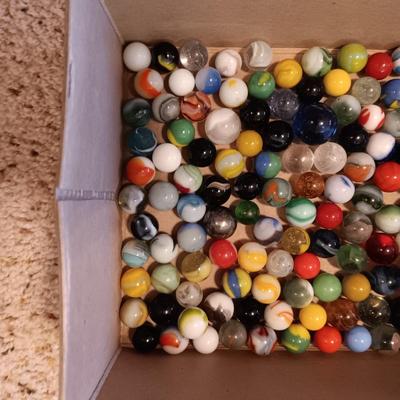 2 PINT SIZE JARS OF MARBLES