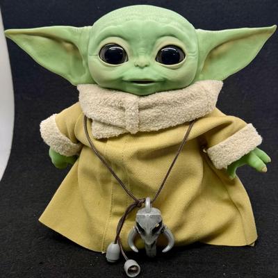 Sale Photo Thumbnail #118: Tested, works as expected. Eyes open and close, ears wiggle, and arms move. Makes many different noises similar to the character on the show. Approx. 7.5" tall.