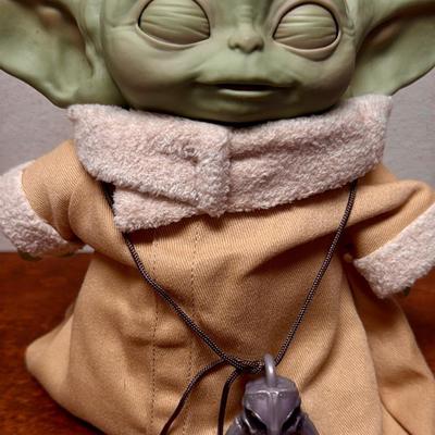 Sale Photo Thumbnail #113: Tested, works as expected. Eyes open and close, ears wiggle, and arms move. Makes many different noises similar to the character on the show. Approx. 7.5" tall.