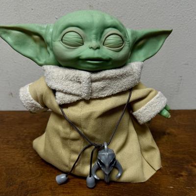 Sale Photo Thumbnail #114: Tested, works as expected. Eyes open and close, ears wiggle, and arms move. Makes many different noises similar to the character on the show. Approx. 7.5" tall.