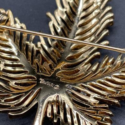 Gold tone brooches