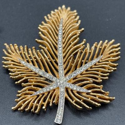 Gold tone brooches