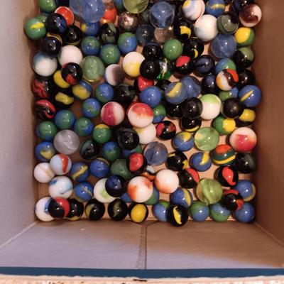 1 QUART JAR AND A SMALLER JAR OF MARBLES