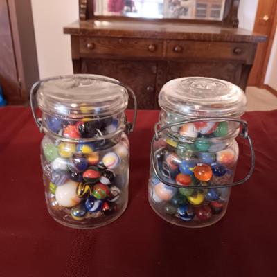 2 PINT JARS OF MARBLES