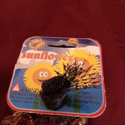 4 UNOPENED BAGS OF MARBLES