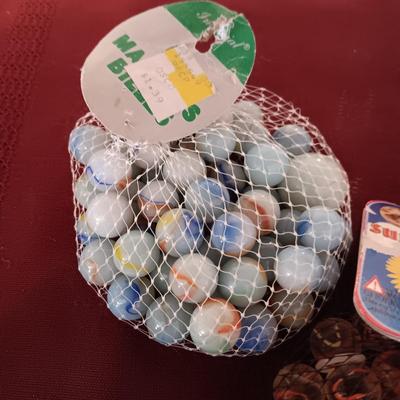 4 UNOPENED BAGS OF MARBLES
