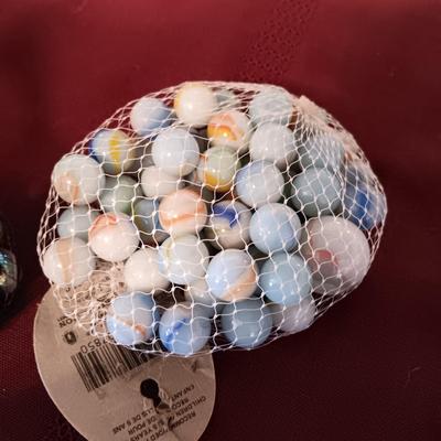 4 UNOPENED BAGS OF MARBLES