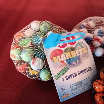 4 BAGS OF UNOPENED MARBLES