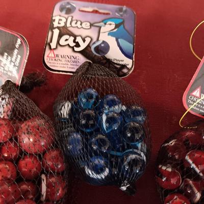 4 UNOPENED BAGS OF MARBLES