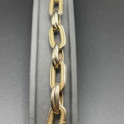 Cream and gold tone bracelets