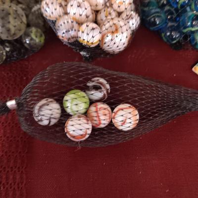 4 UNOPENED BAGS OF MARBLES