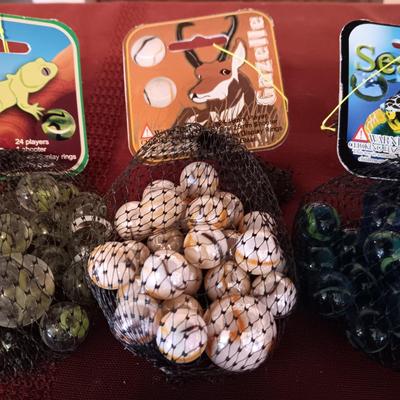 4 UNOPENED BAGS OF MARBLES