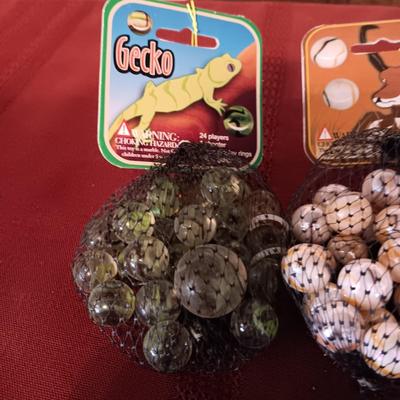 4 UNOPENED BAGS OF MARBLES