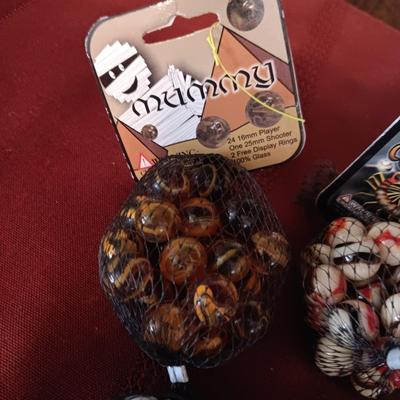 4 UNOPENED BAGS OF MARBLES