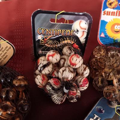 4 UNOPENED BAGS OF MARBLES