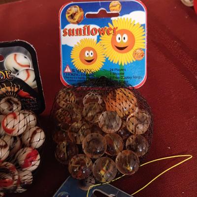 4 UNOPENED BAGS OF MARBLES