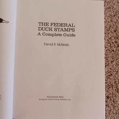 US DEPARTMENT OF THE INTERIOR DUCK STAMPS AND AN INSCRIBED BOOK BY THE AUTHOR
