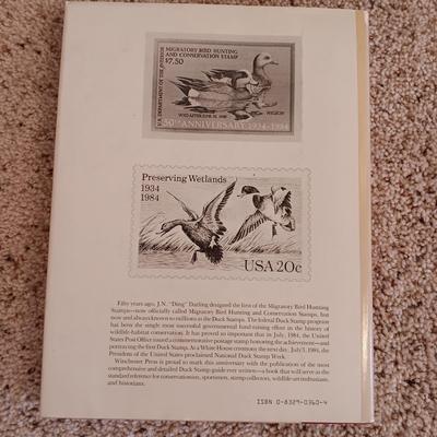 US DEPARTMENT OF THE INTERIOR DUCK STAMPS AND AN INSCRIBED BOOK BY THE AUTHOR