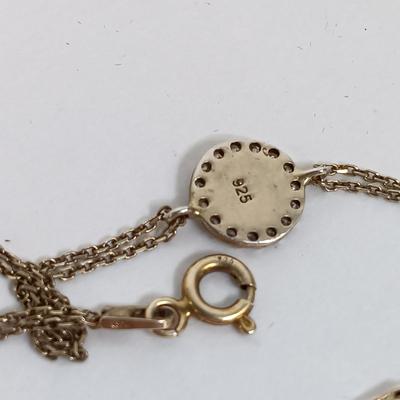 LOT 25: Multi-Colored Gem Bracelet with 925 Chain, Sterling 925 Evil Eye Bracelet, Silver-Tone Angel Pendant & 925 Necklace Chains.