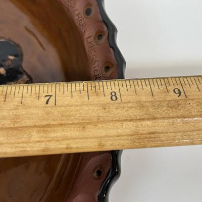 LOT 28: Wooden Charcuterie Boards, Vintage Wear-Ever Citrus Juicer, Crocheted Potholders, A. Loercher Earthenware/ Pottery Pie Plate...