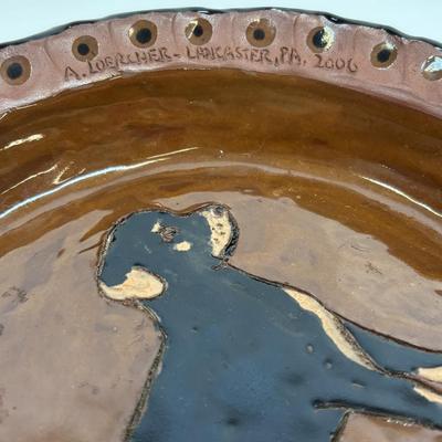 LOT 28: Wooden Charcuterie Boards, Vintage Wear-Ever Citrus Juicer, Crocheted Potholders, A. Loercher Earthenware/ Pottery Pie Plate...