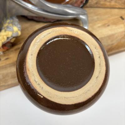 LOT 28: Wooden Charcuterie Boards, Vintage Wear-Ever Citrus Juicer, Crocheted Potholders, A. Loercher Earthenware/ Pottery Pie Plate...