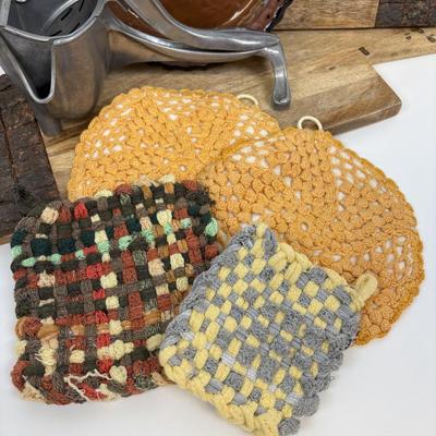 LOT 28: Wooden Charcuterie Boards, Vintage Wear-Ever Citrus Juicer, Crocheted Potholders, A. Loercher Earthenware/ Pottery Pie Plate...