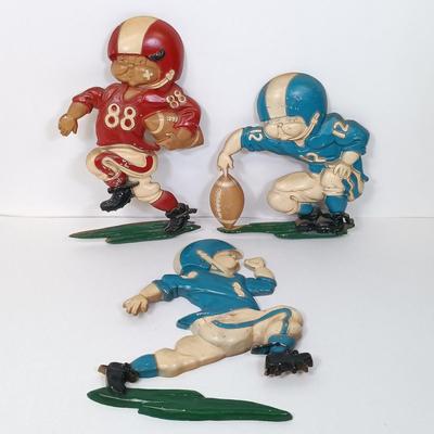 LOT 47: HOMCO 1970s Metal Football Player Wall Plaques