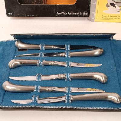LOT 48: New/Old Stock Oneida Steakknives Set of (6), Pfaltzgraff Tango Sugar & Creamer Set & More