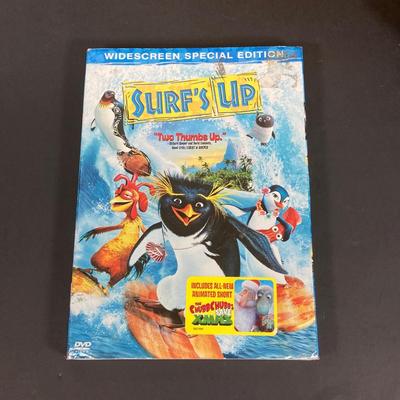 LOT 53: Skater / Surf Collection - Vintage California Free Spirit Skateboard, Surf Dude Shorts (L) with Tags and Surf's Up DVD