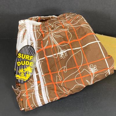 LOT 53: Skater / Surf Collection - Vintage California Free Spirit Skateboard, Surf Dude Shorts (L) with Tags and Surf's Up DVD