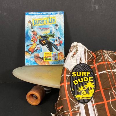 LOT 53: Skater / Surf Collection - Vintage California Free Spirit Skateboard, Surf Dude Shorts (L) with Tags and Surf's Up DVD