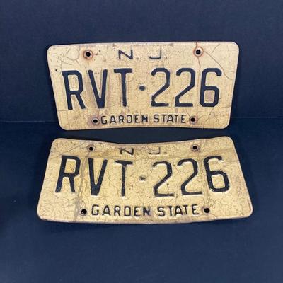 LOT 55: Vintage Collection - NJ License Plates, Limoges Dish, Jameson Flask, Golf Cart Desk Clock, Harley Owners Token and More