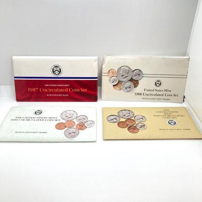 LOT 72: Four US Mint Uncirculated Coin Sets in Original Envelopes - 1987, 1988, 1989 and 1990