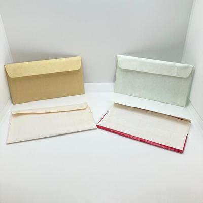 LOT 72: Four US Mint Uncirculated Coin Sets in Original Envelopes - 1987, 1988, 1989 and 1990