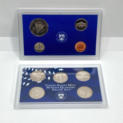 LOT 74: Two 1999 United States Mint Proof Sets and One 1999 United States Mint 50 State Quarters Proof Set