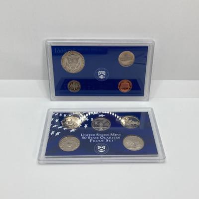 LOT 74: Two 1999 United States Mint Proof Sets and One 1999 United States Mint 50 State Quarters Proof Set