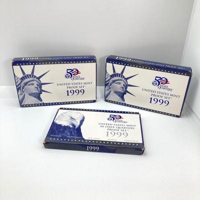 LOT 74: Two 1999 United States Mint Proof Sets and One 1999 United States Mint 50 State Quarters Proof Set
