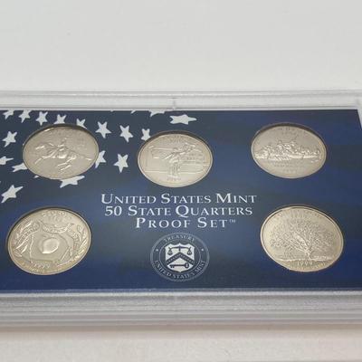LOT 74: Two 1999 United States Mint Proof Sets and One 1999 United States Mint 50 State Quarters Proof Set