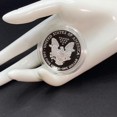 LOT 81: 1996 Walking Liberty Silver American Eagle One Dollar Proof Coin - One Ounce Fine Silver with Presentation Box and Certificate of...