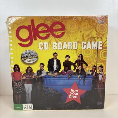 LOT 83: Unopened Rosie O'Donnell Barbie, Glee CD Board Game & Broadway Musical Puzzle