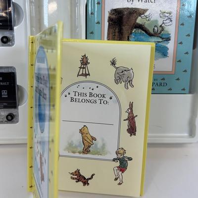 LOT 86: NIP Rug Rats Squeezable Tommy Light, NIP Oral-B Disney's Doc McStuffins Power Toothbrush, Winnie the Pooh Read Out-ALoud...