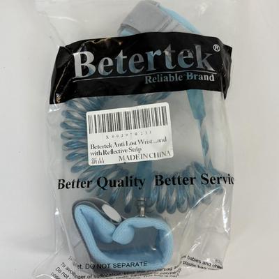 LOT 86: NIP Rug Rats Squeezable Tommy Light, NIP Oral-B Disney's Doc McStuffins Power Toothbrush, Winnie the Pooh Read Out-ALoud...