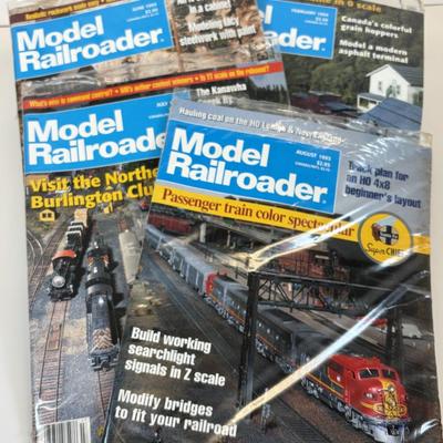 LOT 87: All Aboard! Vintage Hand-Painted Train Locomotive Bookends, Hamilton Collection Numbered Plate & Model Railroaded Magazines