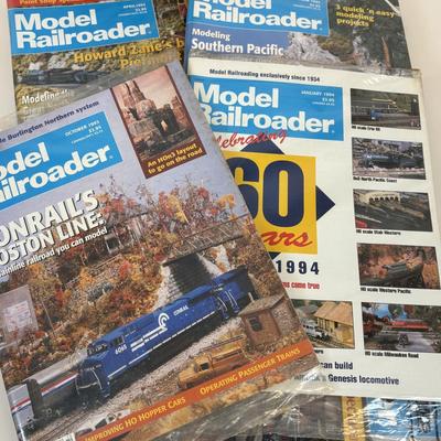 LOT 87: All Aboard! Vintage Hand-Painted Train Locomotive Bookends, Hamilton Collection Numbered Plate & Model Railroaded Magazines