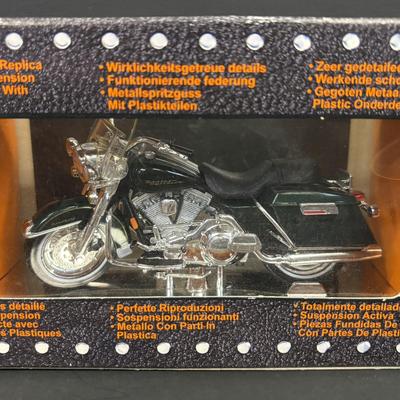 LOT 94: Harley Davidson Collection: Dept 56, Maisto FXSTSB Bad Boy & FLHR Road King Diecast Replicas, NIP Timer Cover & Ornaments