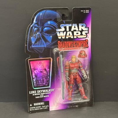 LOT 97: Star War Action Figures along with Star Wars Trilogy