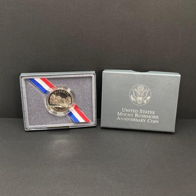 LOT 100: 1991 United States Mount Rushmore Anniversary Half Dollar Proof Coin with Presentation Box and Certificate of Authenticity