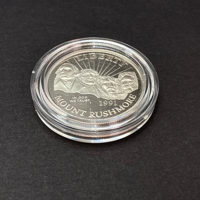 LOT 100: 1991 United States Mount Rushmore Anniversary Half Dollar Proof Coin with Presentation Box and Certificate of Authenticity