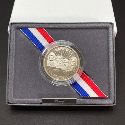 LOT 100: 1991 United States Mount Rushmore Anniversary Half Dollar Proof Coin with Presentation Box and Certificate of Authenticity